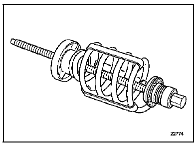 Mettre en place l'outil Sus. 1656 sur le ressort.