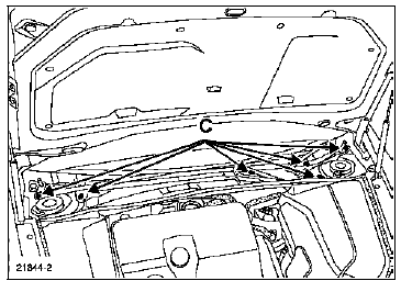 Incliner le mécanisme pour le sortir de son logement.