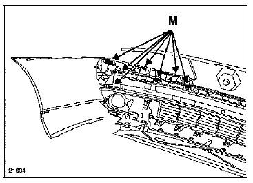 Déposer les clips (M) puis retirer l'absorbeur,