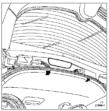 Déposer les fixations supérieures du rideau pare-soleil